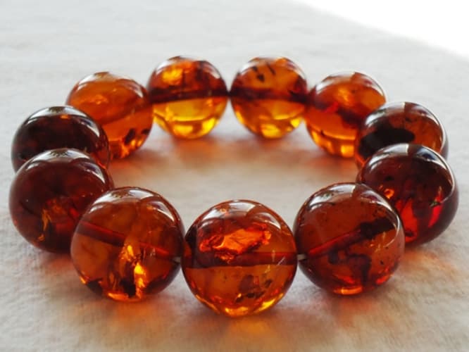 Amber bracelets_ color is _tea with sparkle bubbles inside_